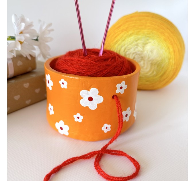 Small orange crochet yarn holder bowl with retro daisy flowers Knitter gifts