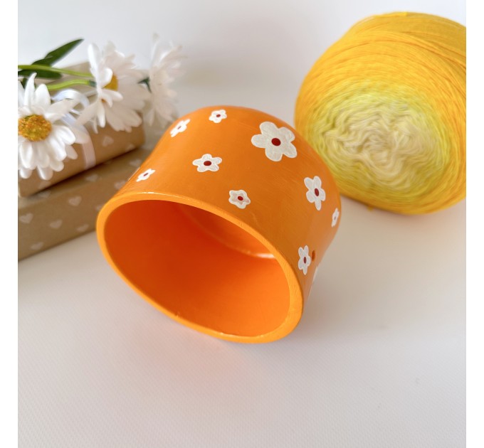 Small orange crochet yarn holder bowl with retro daisy flowers Knitter gifts