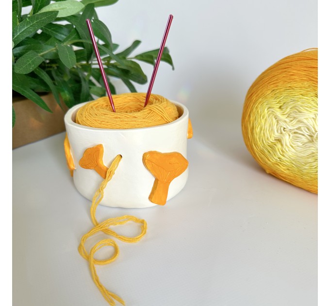 Small crochet yarn bowl with chanterelle mushrooms