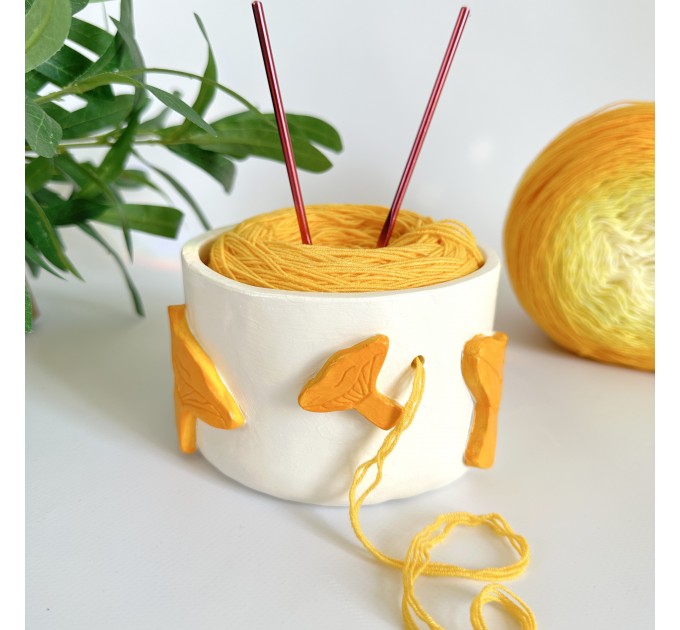 Small crochet yarn bowl with chanterelle mushrooms