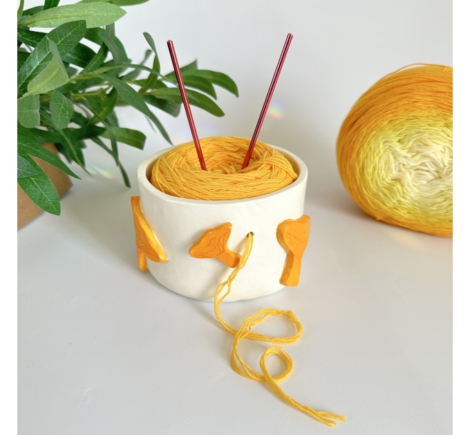 Small crochet yarn bowl with chanterelle mushrooms