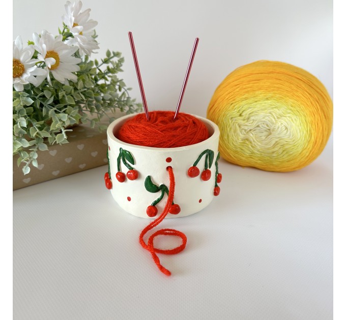 Small milky white crochet yarn holder bowl with red cherries and dots Knitters crocheters