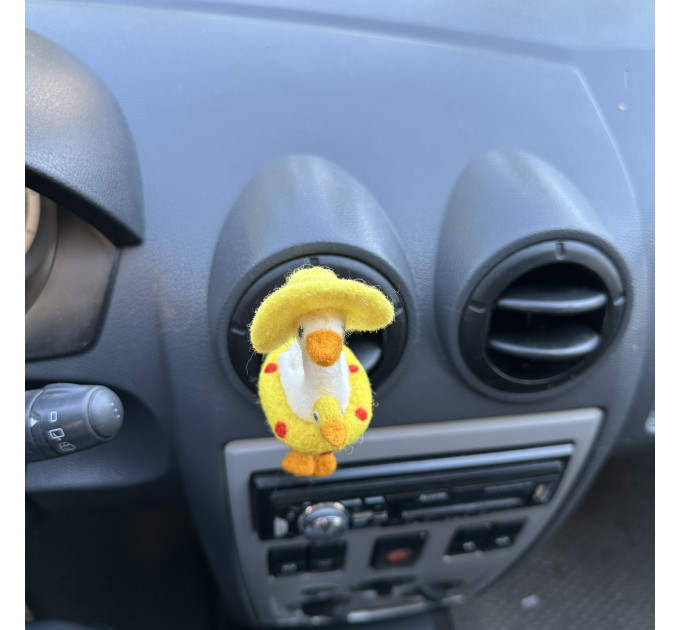 Summer goose with sun hat and yellow duck swim ring air vent clip
