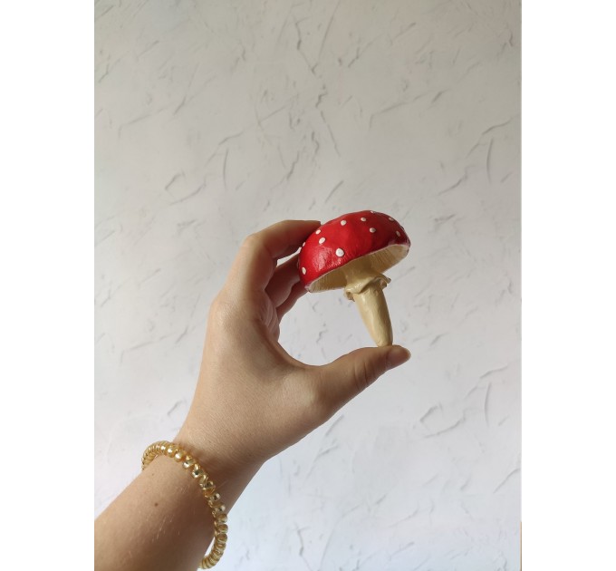 Inverted amanita mushroom incense stick holder