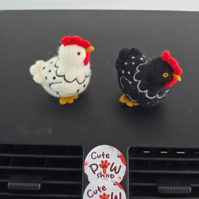 Chicken with ornaments car dashboard