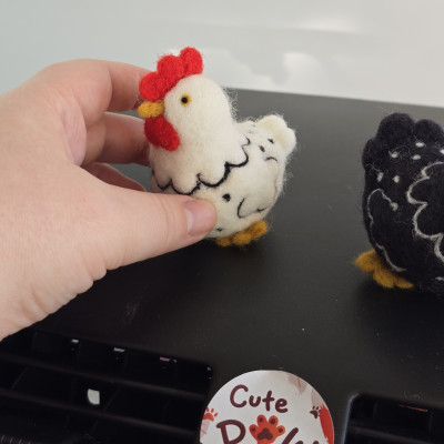 Chicken with ornaments car dashboard