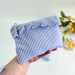 Blue striped laptop sleeve with ruffles