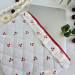 Laptop sleeve with cherries and ruffles
