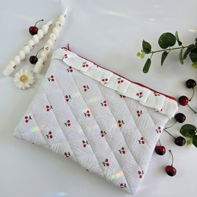Laptop sleeve with cherries and ruffles
