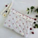 Laptop sleeve with cherries and ruffles