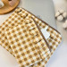 Latte vibe checkered brown laptop sleeve with ruffles