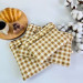 Latte vibe checkered brown laptop sleeve with ruffles