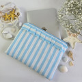 Sky-blue striped laptop sleeve with ruffles