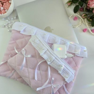 Soft pink laptop sleeve with ruffles, bows and pearl-like beads