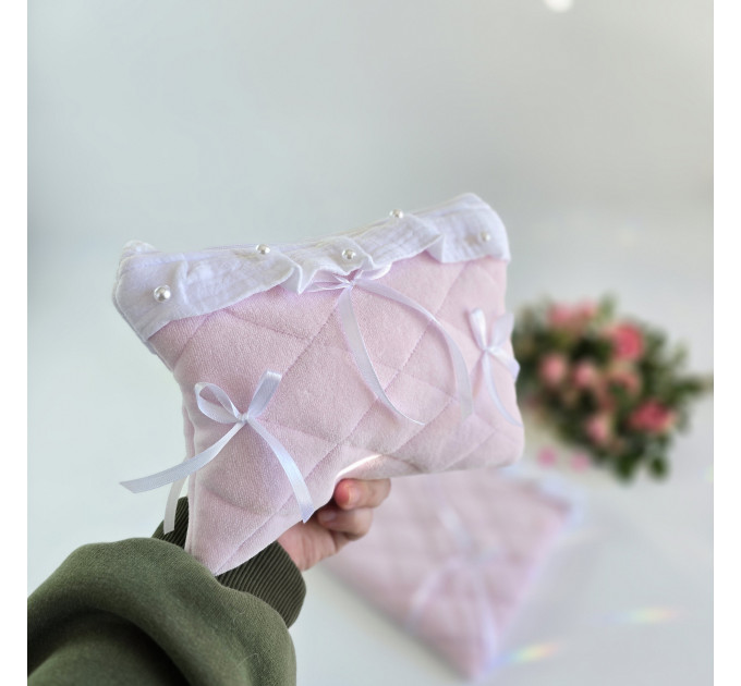 Soft pink laptop sleeve with ruffles, bows and pearl-like beads