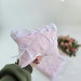 Soft pink laptop sleeve with ruffles, bows and pearl-like beads