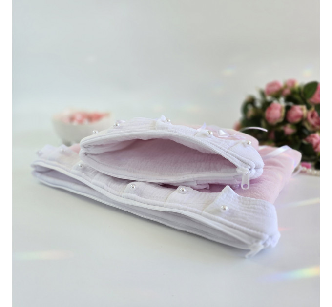 Soft pink laptop sleeve with ruffles, bows and pearl-like beads