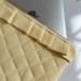 Butter yellow laptop sleeve with ruffles