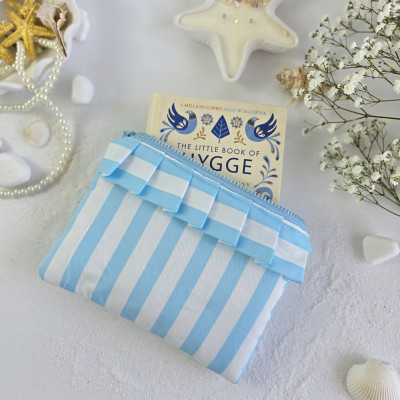 Sky-blue striped E-reader sleeve with ruffles