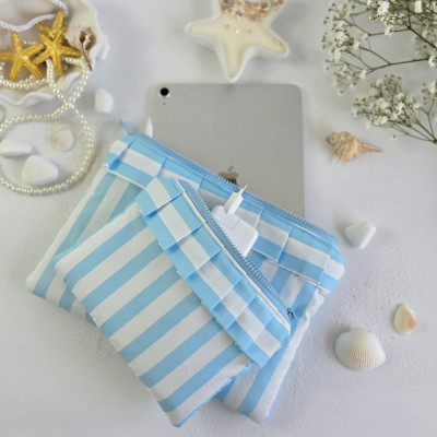 Sky-blue striped tablet sleeve with ruffles