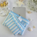 Sky-blue striped tablet sleeve with ruffles