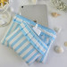 Sky-blue striped tablet sleeve with ruffles