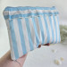 Sky-blue striped tablet sleeve with ruffles