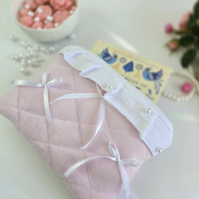 Soft pink E-reader sleeve with ruffles, bows and pearl-like beads