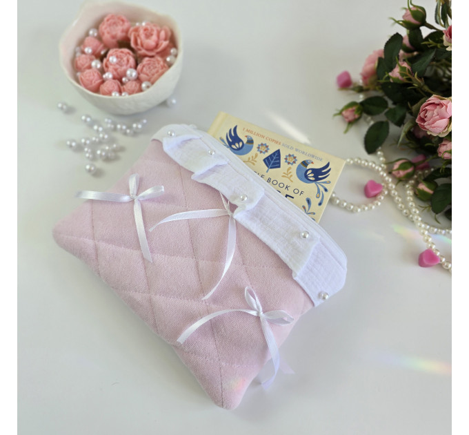 Soft pink E-reader sleeve with ruffles, bows and pearl-like beads