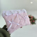 Soft pink E-reader sleeve with ruffles, bows and pearl-like beads