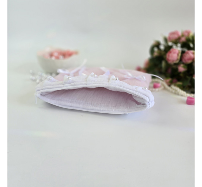 Soft pink E-reader sleeve with ruffles, bows and pearl-like beads