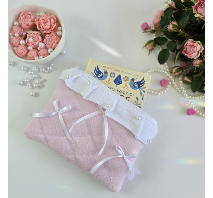 Soft pink E-reader sleeve with ruffles, bows and pearl-like beads