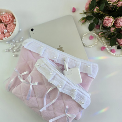 Soft pink tablet sleeve with ruffles, bows and pearl-like beads