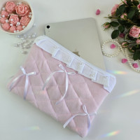 Soft pink tablet sleeve with ruffles, bows and pearl-like beads