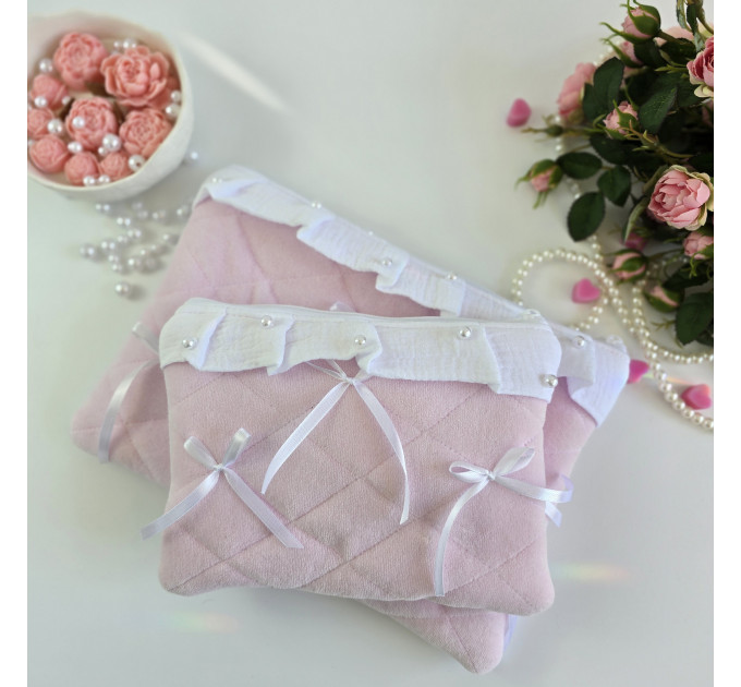Soft pink tablet sleeve with ruffles, bows and pearl-like beads
