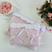 Soft pink tablet sleeve with ruffles, bows and pearl-like beads