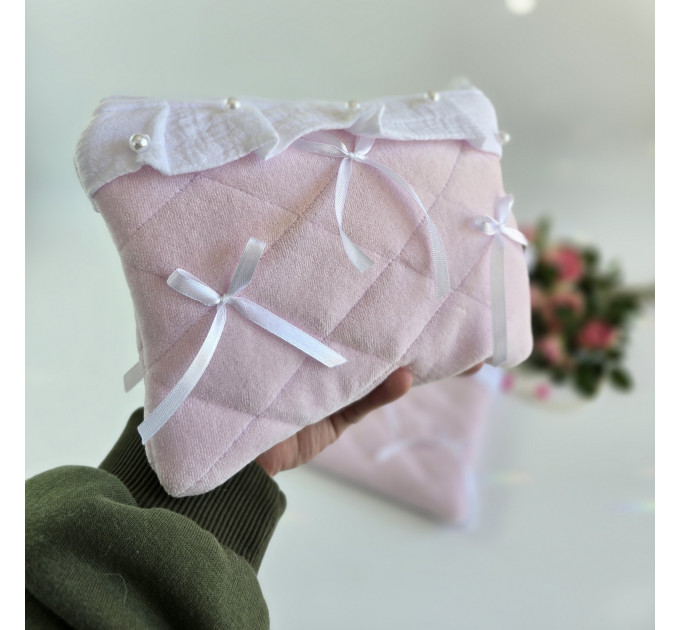 Soft pink tablet sleeve with ruffles, bows and pearl-like beads