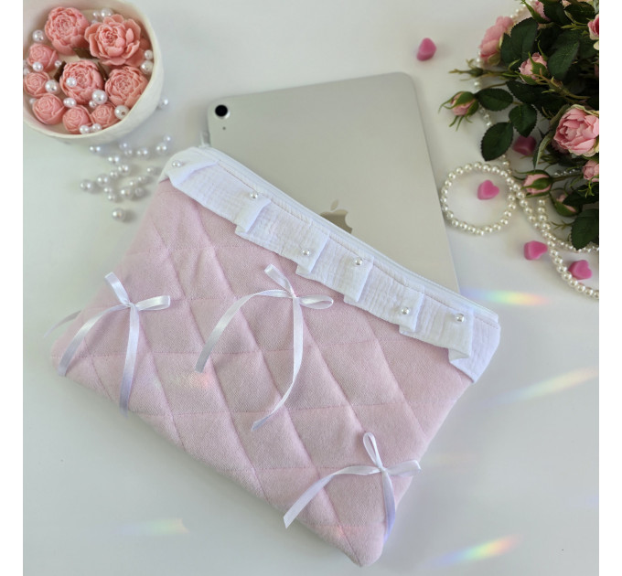 Soft pink tablet sleeve with ruffles, bows and pearl-like beads
