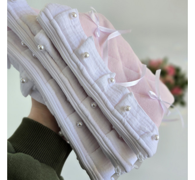 Soft pink tablet sleeve with ruffles, bows and pearl-like beads