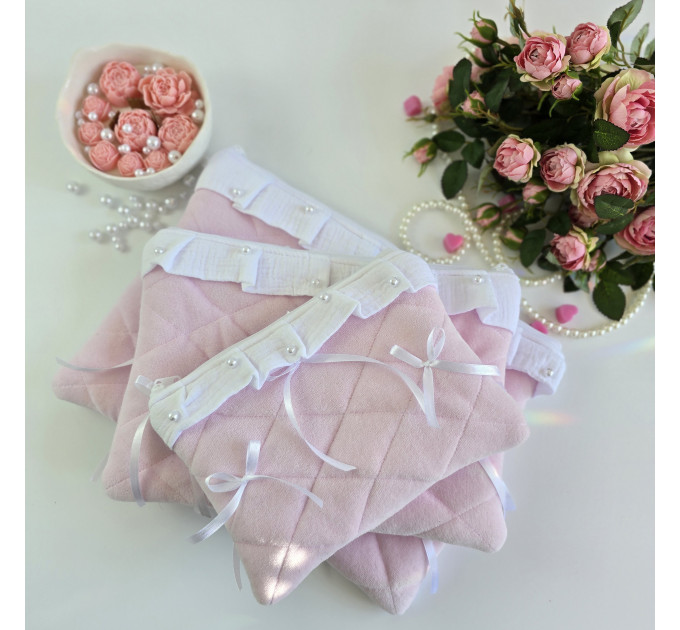 Soft pink tablet sleeve with ruffles, bows and pearl-like beads