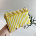 Yellow striped E-reader sleeve with ruffles