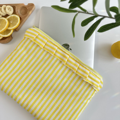 Yellow striped laptop sleeve with ruffles