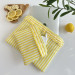 Yellow striped laptop sleeve with ruffles