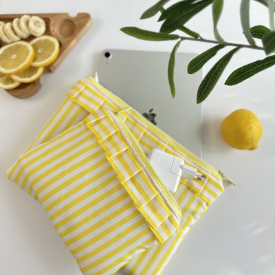 Yellow striped tablet sleeve with ruffles