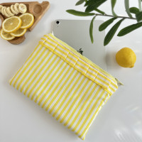 Yellow striped tablet sleeve with ruffles