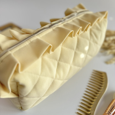 Large butter yellow cosmetic bag with ruffles