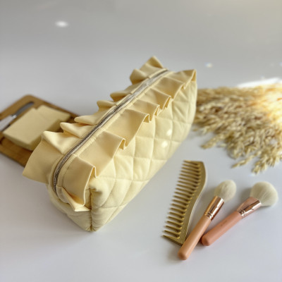 Large butter yellow cosmetic bag with ruffles