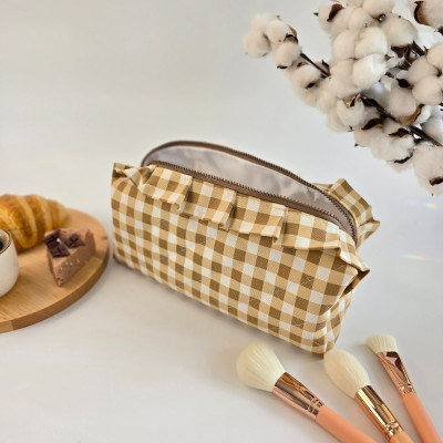 Large checkered brown cosmetic bag with ruffles