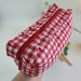 Large red gingham cosmetic bag with ruffles
