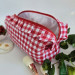Large red gingham cosmetic bag with ruffles